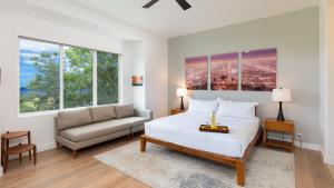 Katil atau katil-katil dalam bilik di ❤PiH❤ Sun Ray RetreatOcean Sunsets ViewsOptional Mauna Kea Hotel Privileges