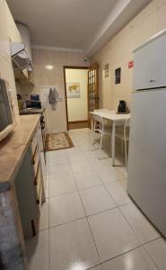 Η κουζίνα ή μικρή κουζίνα στο Guest House Da Mata3 +52 φωτογραφίες