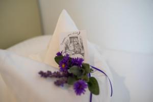 Postel nebo postele na pokoji v ubytování Hotel Leicht