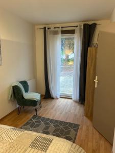 Postel nebo postele na pokoji v ubytování Studio indépendant Lisieux