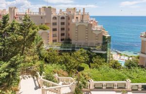 a view of a city and the ocean at La Mer Welcome in Golden Sands