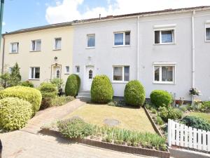 Κήπος έξω από το Tolles Ferienhaus in Wismar für 8 Personen