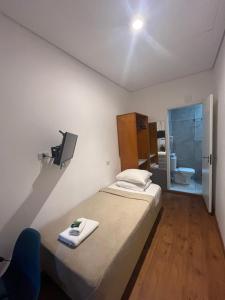 Voodi või voodid majutusasutuse Bistu Hotel - Vila Nova Conceição toas