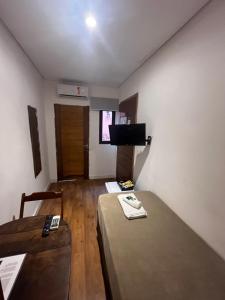 Televiisor ja/või meelelahutuskeskus majutusasutuses Bistu Hotel - Vila Nova Conceição