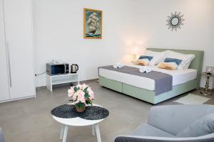 Postel nebo postele na pokoji v ubytování Villa Mila