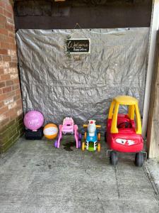 a group of toys are sitting in a garage at Private - Spacious with Jacuzzi and Great Location in Mississauga