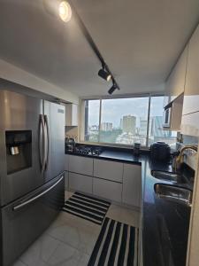 Η κουζίνα ή μικρή κουζίνα στο Penthouse