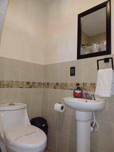 Koupelna v ubytování Hotel Libertad