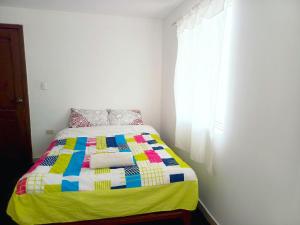 Postel nebo postele na pokoji v ubytování Hotel CasaBlanca"Tablon de miraflores"