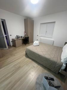 Postel nebo postele na pokoji v ubytování B&B La Terrazza Polifrone