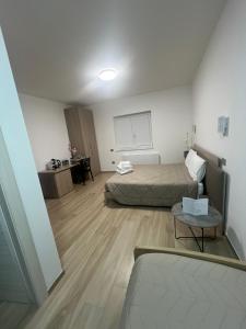 Postel nebo postele na pokoji v ubytování B&B La Terrazza Polifrone