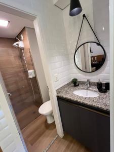 Et badeværelse på 12 Apartamento Estiloso!