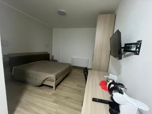 TV a/nebo společenská místnost v ubytování B&B La Terrazza Polifrone