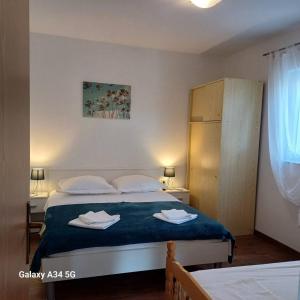 Katil atau katil-katil dalam bilik di Apartments Saric