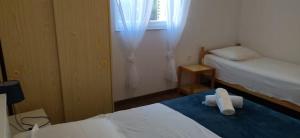 Katil atau katil-katil dalam bilik di Apartments Saric