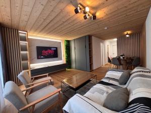 Khu vực ghế ngồi tại Luxuse Ferienwohnung Flüe 11