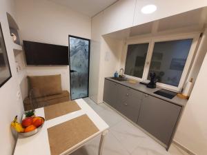 Η κουζίνα ή μικρή κουζίνα στο Riverside Elegance