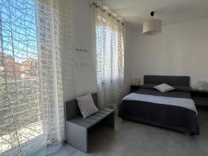 Postel nebo postele na pokoji v ubytování El Fossadeu-Biassa-Cinque Terre