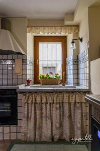 Nhà bếp/bếp nhỏ tại La Terrazza di Tranci