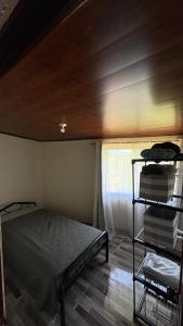 A bed or beds in a room at Skyline Great View