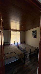 A bed or beds in a room at Skyline Great View