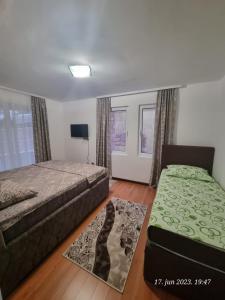 Postel nebo postele na pokoji v ubytování BOK HOLIDAY HOME Petrovac