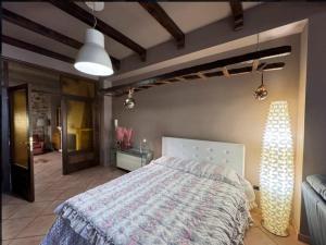 Postel nebo postele na pokoji v ubytování B&B Sant'Angelo