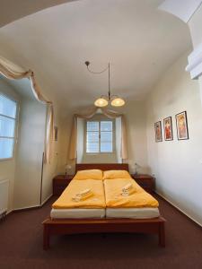 Uma cama ou camas num quarto em Dalmo