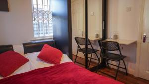 Ένα ή περισσότερα κρεβάτια σε δωμάτιο στο Southgate Home Stay