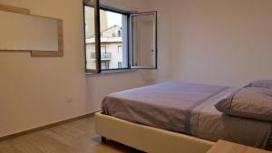 Postel nebo postele na pokoji v ubytování Apartaments Luxury Schiavonea + 3 fotografie