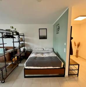 a bedroom with a bed in a room at Penthouse-Apartment am Schloss in Brühl +12 photos