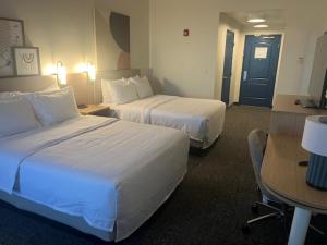 Spark by Hilton Phoenix East Mesa客房内的一张或多张床位