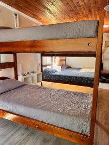 Postel nebo postele na pokoji v ubytování Hostal Treile