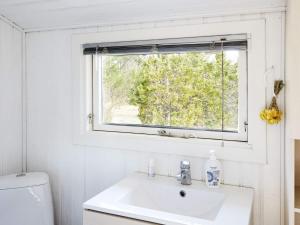 Koupelna v ubytování Cozy Retreat in Ellinge Lyng - By Traum Ferienwohnungen + 17 fotografií