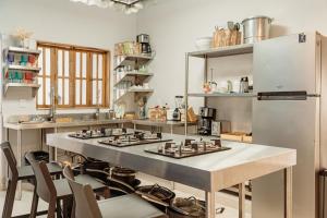 Kuchyň nebo kuchyňský kout v ubytování Kualena Hostal + 21 fotografií