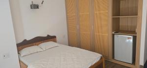 Postel nebo postele na pokoji v ubytování motel 108