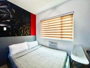 Ένα ή περισσότερα κρεβάτια σε δωμάτιο στο Award-Winning Stay in the City