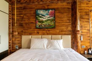 Postel nebo postele na pokoji v ubytování The Mong Garden Homestay SaPa
