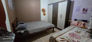 Postel nebo postele na pokoji v ubytování QUARTO para casal com BANHEIRO COMPARTILHADO