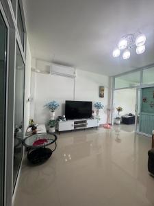 Μια τηλεόραση ή/και κέντρο ψυχαγωγίας στο Cozy Holiday Home-Y