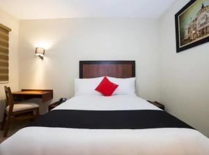 Postel nebo postele na pokoji v ubytování Hotel Colonial Acopinalco Inn