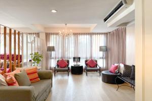 Posezení v ubytování Rasa Boutique Hotel Chiang Rai