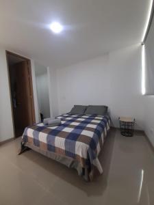 Ένα ή περισσότερα κρεβάτια σε δωμάτιο στο Luxury apartment citadela di sole , santafe de antioquia +19 φωτογραφίες