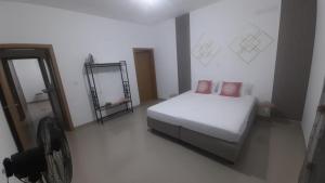 Postel nebo postele na pokoji v ubytování G&R Apart