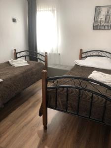 Postel nebo postele na pokoji v ubytování Verona Apartment