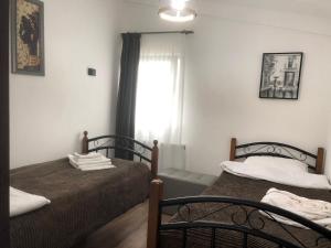 Postel nebo postele na pokoji v ubytování Verona Apartment