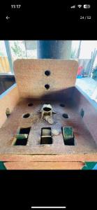a wooden box with some items on top of it at La HACIENDA LODGE & CAMPING in Santa Teresa