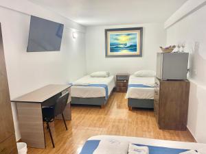 Letto o letti in una camera di ADDA Pacasmayo