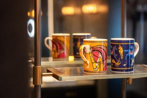 Arthur Hotel Luogang Xiangang Metro Guangzhou-Free Breakfast and Free Afternoon Teaにあるコーヒーまたはお茶