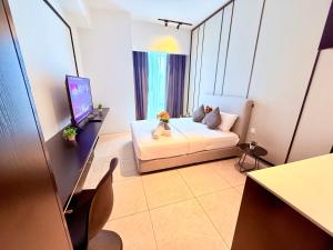TV a/nebo společenská místnost v ubytování Axon Residence Bukit Bintang By Lux Stay KLCC Pavillion